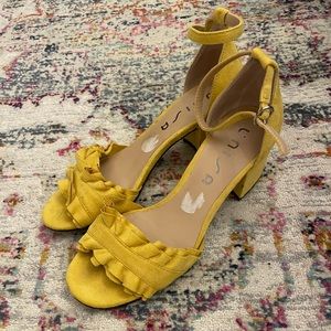 Yellow ruffle heeled sandals